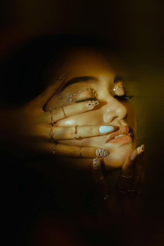 Model wearing mixed nail art gel wraps
